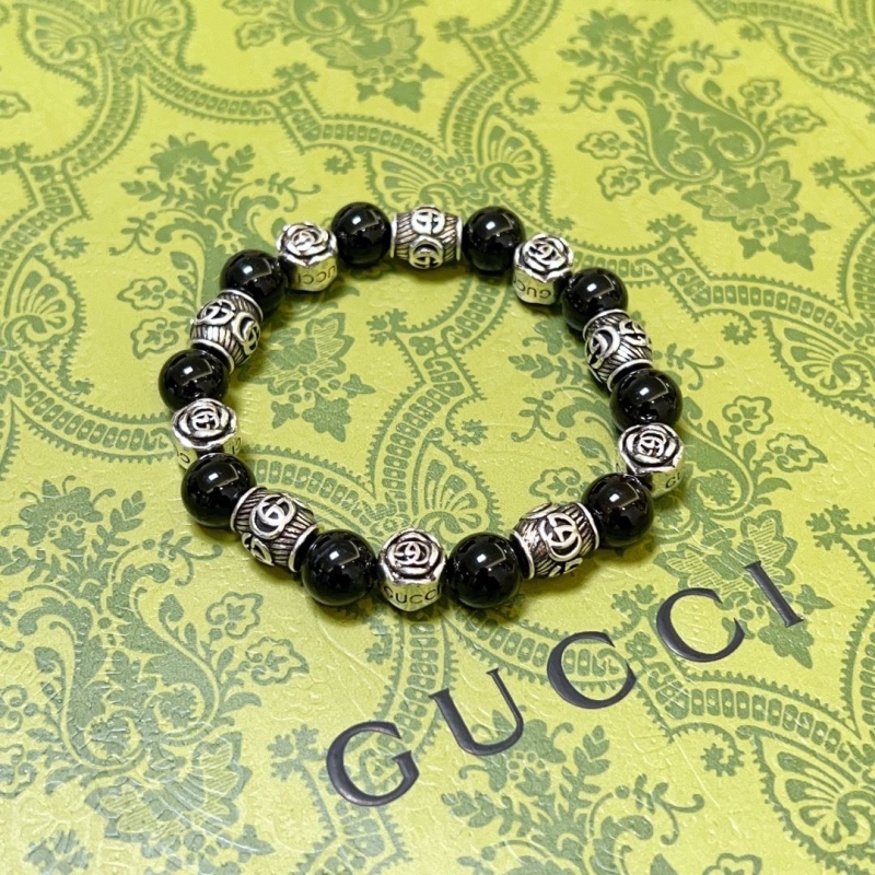 G*u*i bracelets